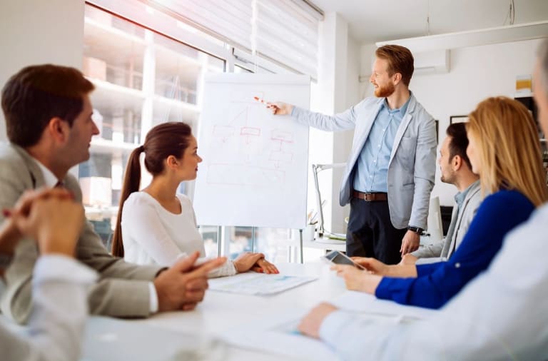 A man is giving a presentation to an audience.